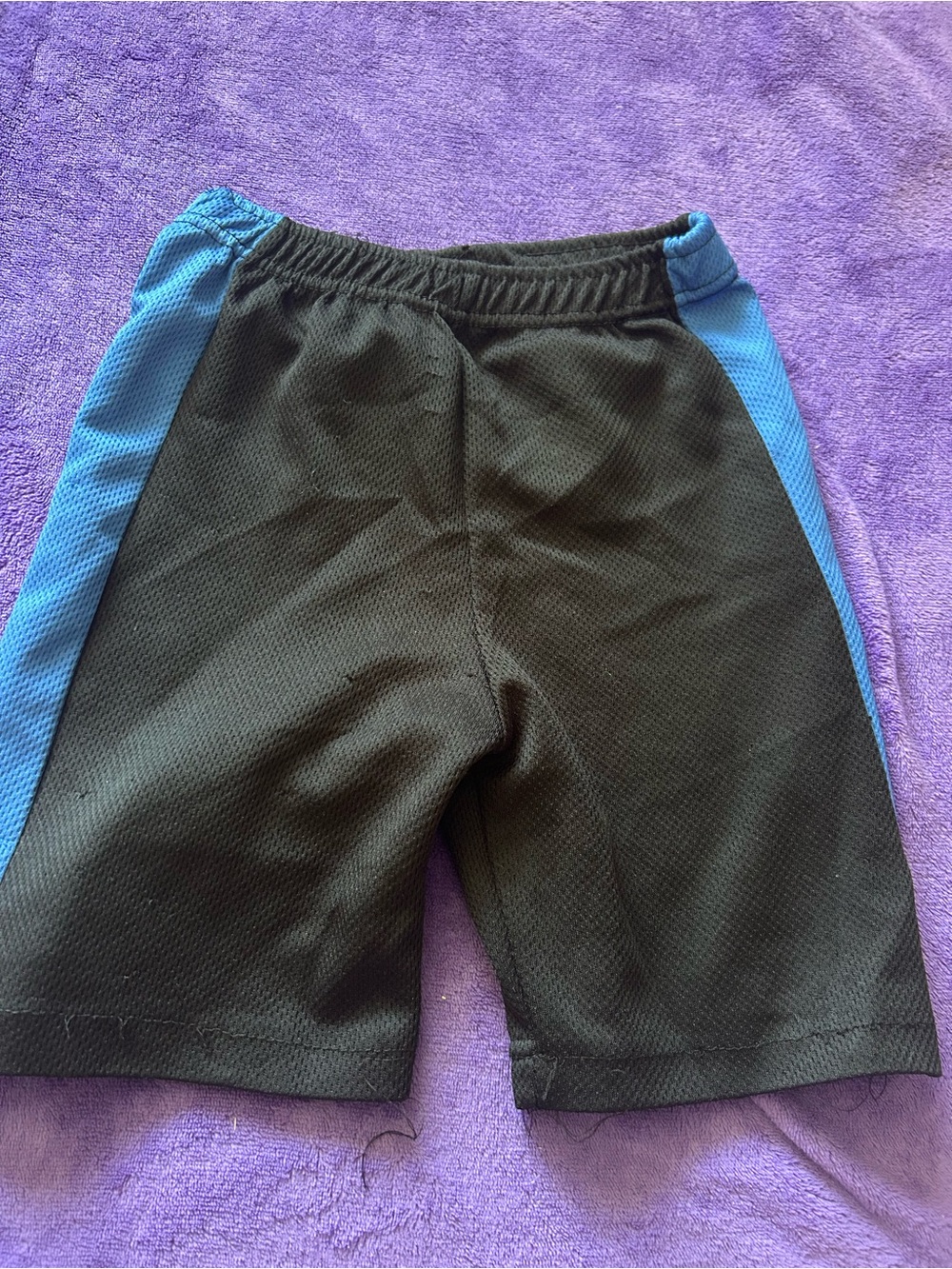 Black Athletic Shorts with Blue Side Panels